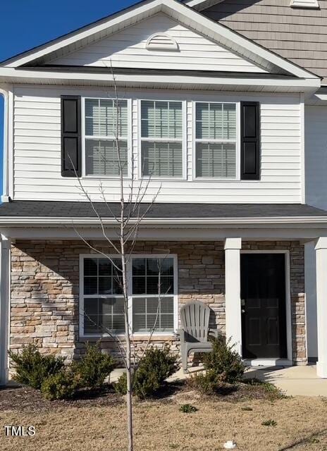 view of front of house featuring stone siding