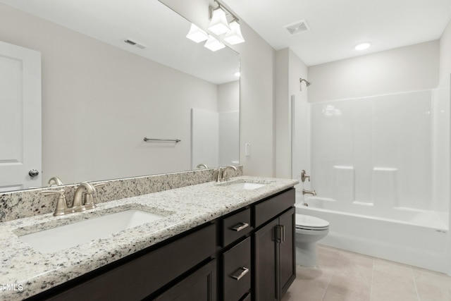 full bathroom with visible vents, a sink, and tile patterned floors