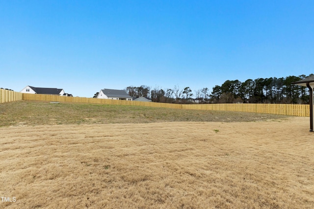 view of yard featuring fence