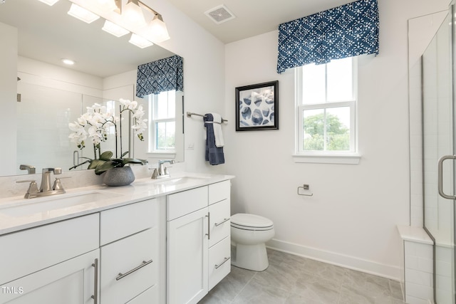 full bath with a stall shower, visible vents, and a sink