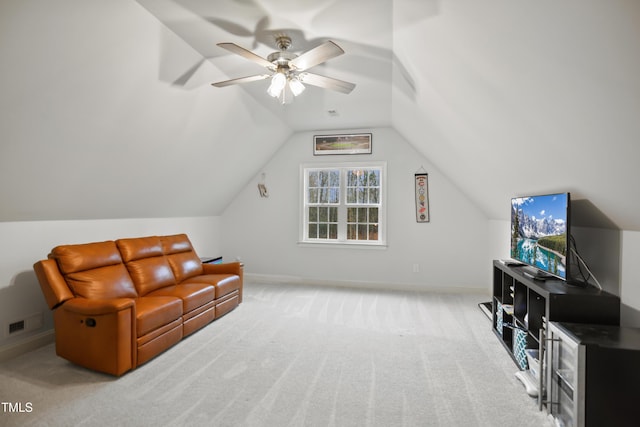 interior space with lofted ceiling, carpet flooring, visible vents, and baseboards