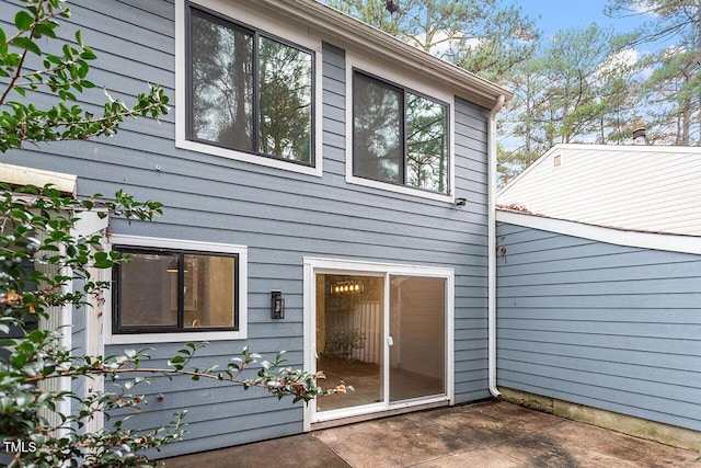 back of house with a patio area