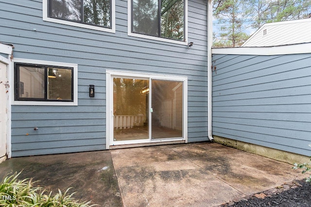 doorway to property featuring a patio