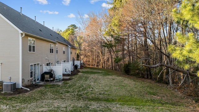 view of yard with a patio area and central AC