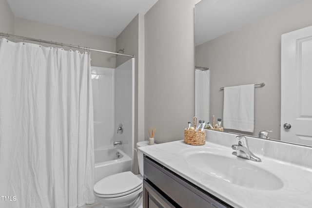 full bath featuring toilet, vanity, and shower / bath combo