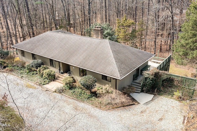 aerial view featuring a view of trees