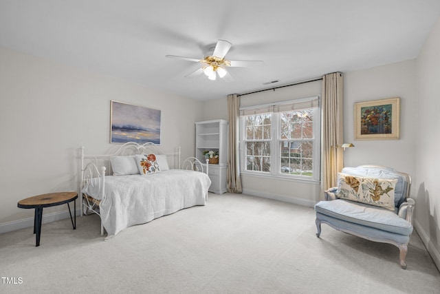 bedroom with a ceiling fan, carpet, visible vents, and baseboards