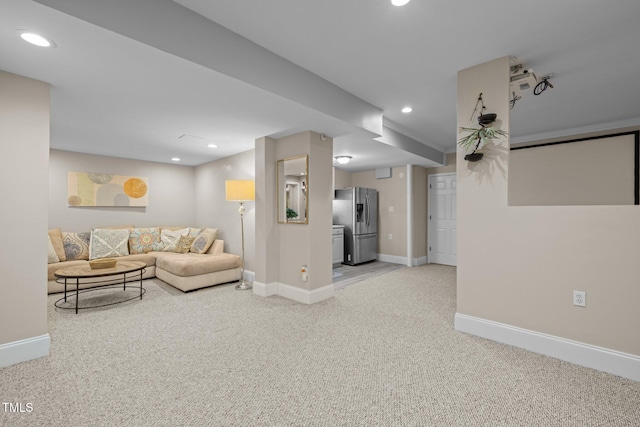 living area with carpet flooring, recessed lighting, and baseboards