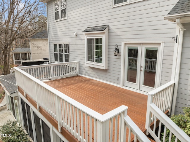 wooden deck featuring french doors