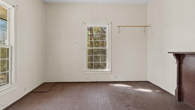 unfurnished living room featuring hardwood / wood-style floors