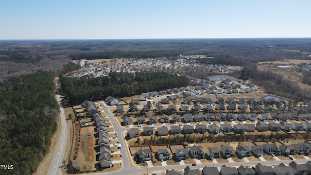 aerial view with a residential view and a water view