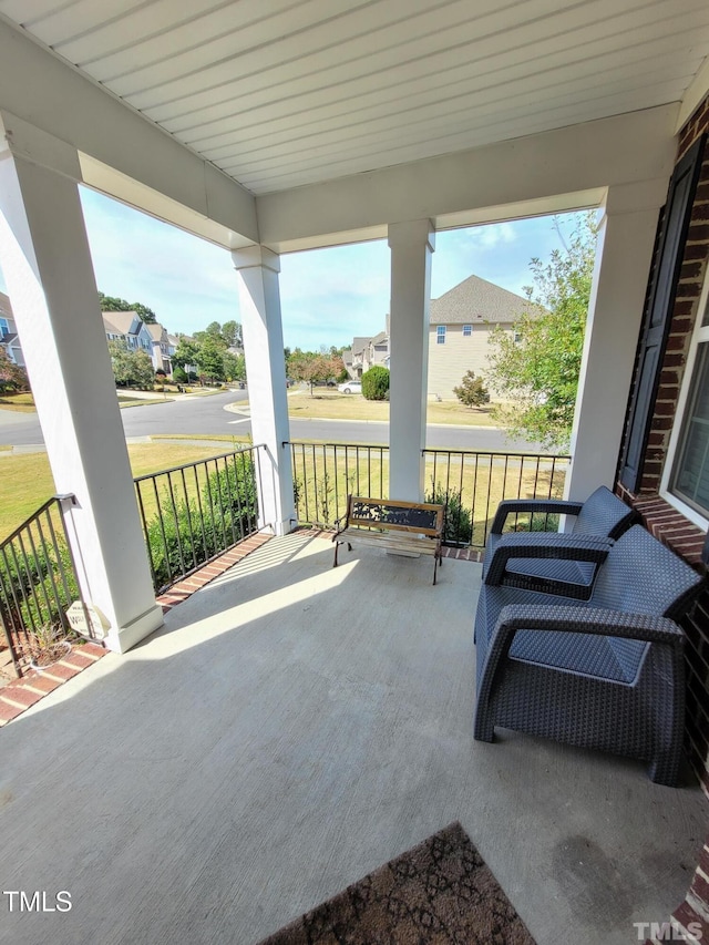 view of patio featuring a porch