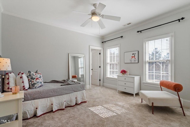 bedroom with multiple windows, carpet, visible vents, and crown molding