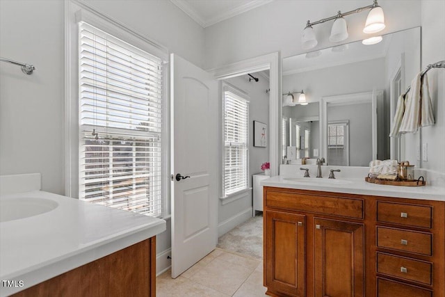 bathroom featuring crown molding, vanity, and tile patterned floors