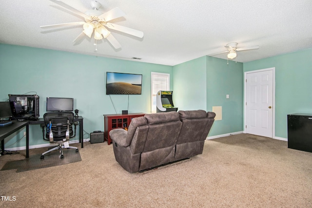 carpeted living room featuring visible vents, ceiling fan, a textured ceiling, and baseboards