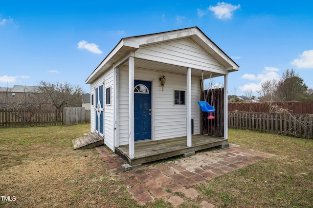 view of outbuilding featuring an outbuilding and a fenced backyard