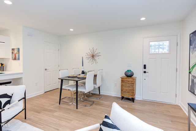 interior space featuring light wood-style floors, recessed lighting, and baseboards