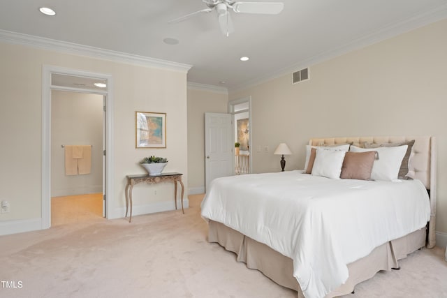 carpeted bedroom with visible vents, crown molding, and baseboards