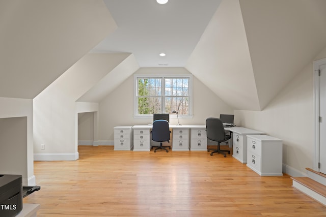 office area with lofted ceiling, light wood-style floors, and baseboards