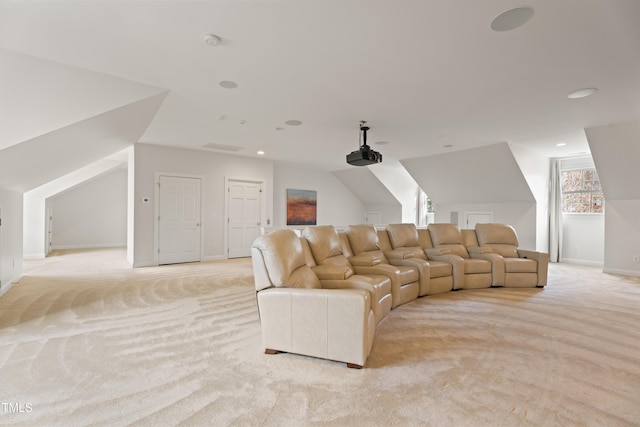 interior space with light carpet, vaulted ceiling, recessed lighting, and baseboards