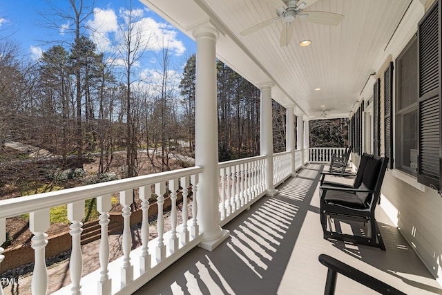 balcony featuring a porch and a ceiling fan