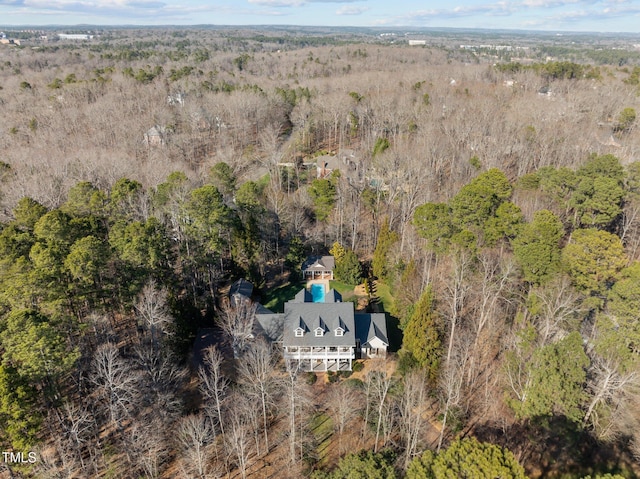 drone / aerial view with a view of trees