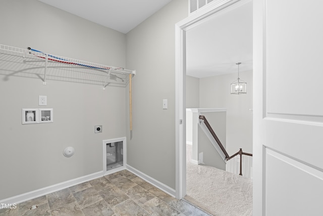 laundry area with baseboards, gas dryer hookup, washer hookup, laundry area, and hookup for an electric dryer