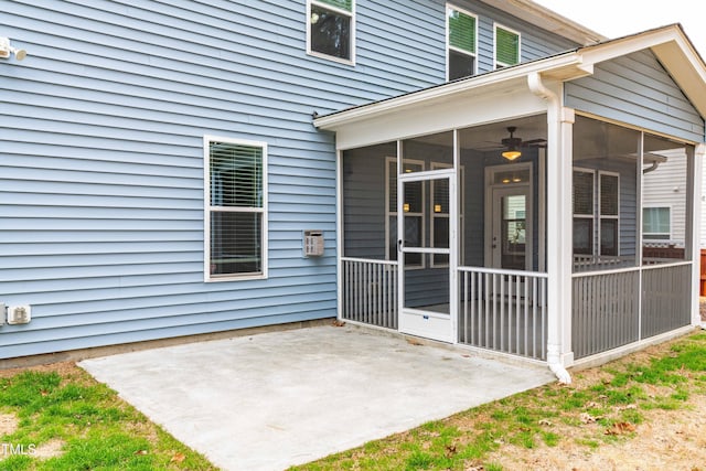 view of patio / terrace with a sunroom