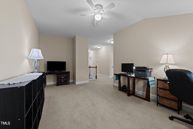 office with carpet floors, baseboards, vaulted ceiling, and a ceiling fan