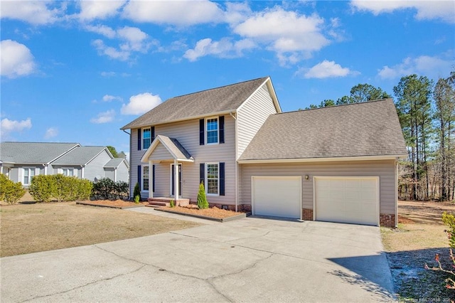 colonial house with a garage, concrete driveway, roof with shingles, and crawl space