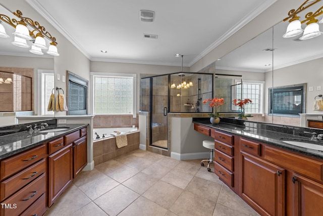 bathroom with a sink, visible vents, and a stall shower