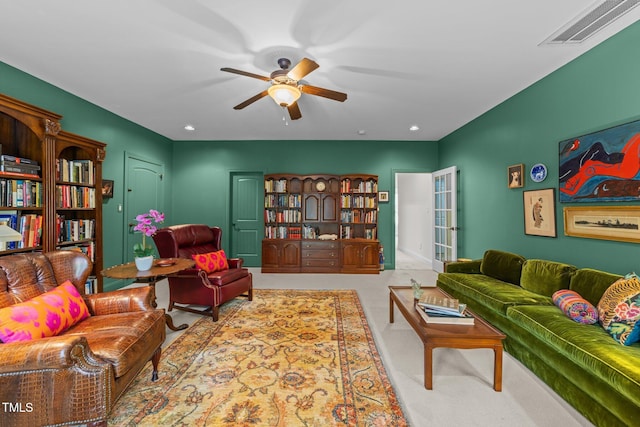 living room featuring carpet flooring, recessed lighting, visible vents, and ceiling fan