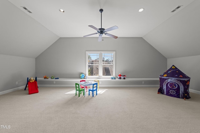 rec room featuring carpet, lofted ceiling, a ceiling fan, and visible vents