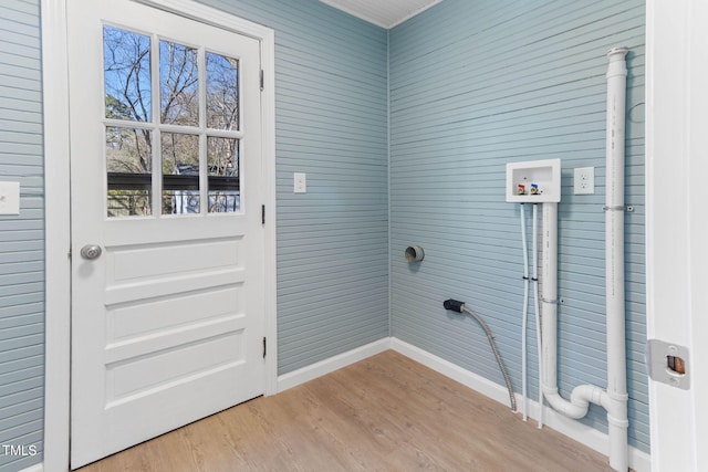 laundry room featuring laundry area, washer hookup, and light wood-style floors