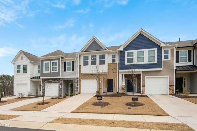 131 Wildflower Cir, Clayton, NC 27520 - multi unit property featuring stone siding, driveway, an attached garage, and board and batten siding