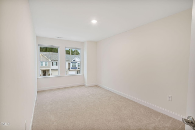 131 Wildflower Cir, Clayton, NC 27520 - empty room with carpet, baseboards, and recessed lighting