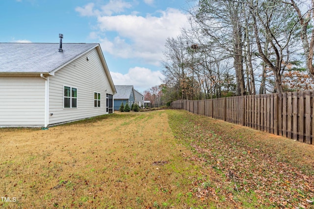 view of yard featuring a fenced backyard