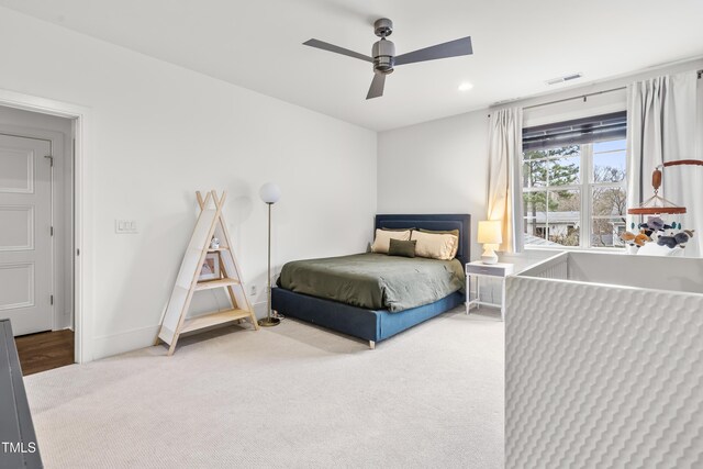 bedroom with visible vents, a ceiling fan, recessed lighting, baseboards, and light colored carpet