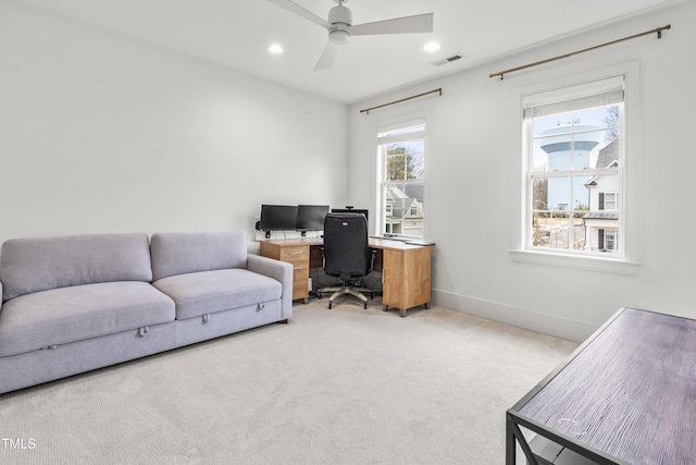 office space with visible vents, baseboards, light carpet, recessed lighting, and a ceiling fan