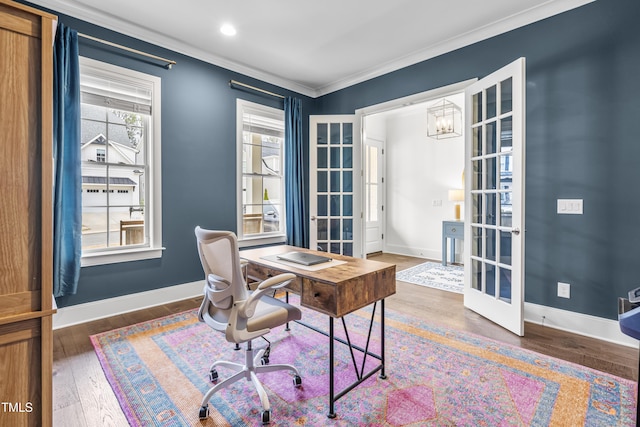 home office with crown molding, french doors, baseboards, and wood-type flooring