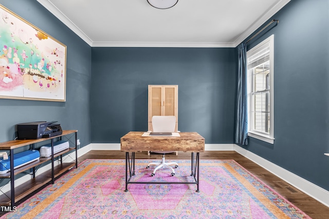 office space featuring ornamental molding, baseboards, and wood finished floors