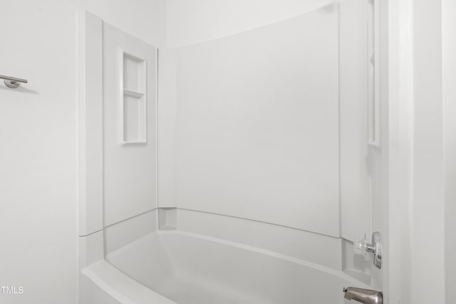 full bath featuring shower / tub combination