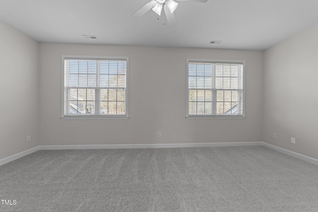 10133 Bessborough Dr, Raleigh, NC 27617 - unfurnished room featuring a wealth of natural light, visible vents, and a ceiling fan