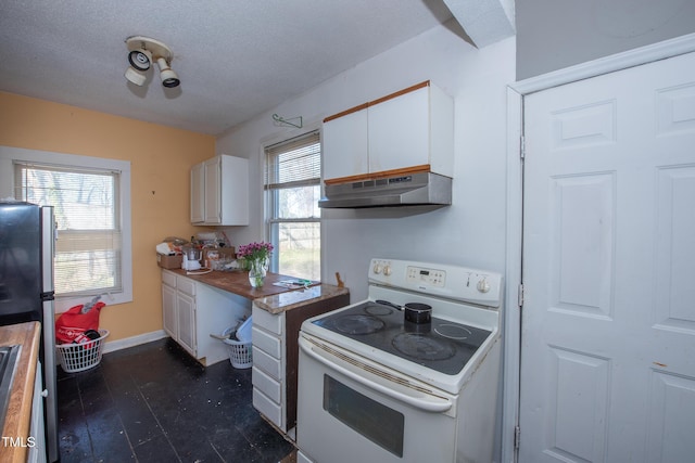 kitchen with a textured ceiling, under cabinet range hood, white cabinetry, baseboards, and white electric range oven