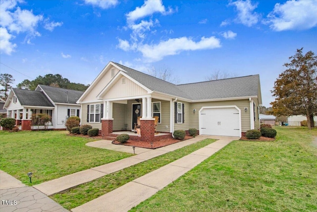 view of front of property with a front yard, concrete driveway, covered porch, and an attached garage