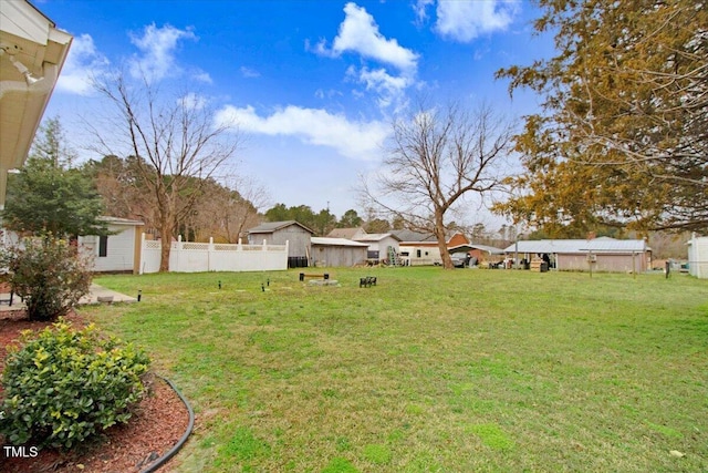 view of yard with fence