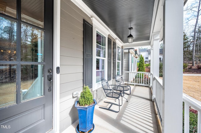 balcony featuring a porch