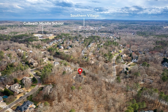 drone / aerial view with a forest view