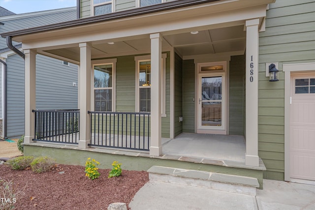 property entrance featuring covered porch