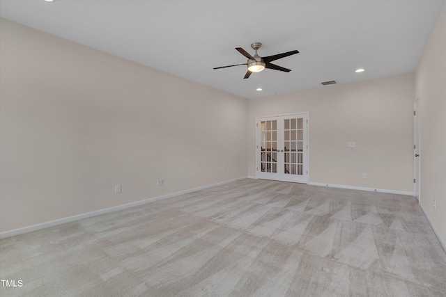 spare room featuring a ceiling fan, recessed lighting, french doors, and baseboards